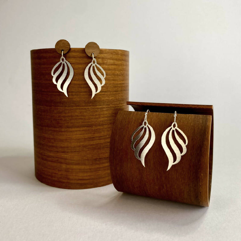 go-do-good-nautilus-earrings-on-wood2