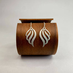 go-do-good-nautilus-earrings-on-wood1