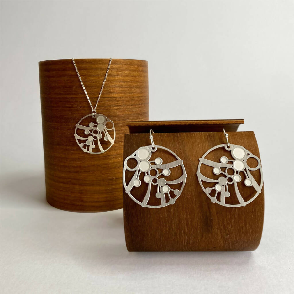 go-do-good-wattle-earrings-and-pendant-necklace-on-wood