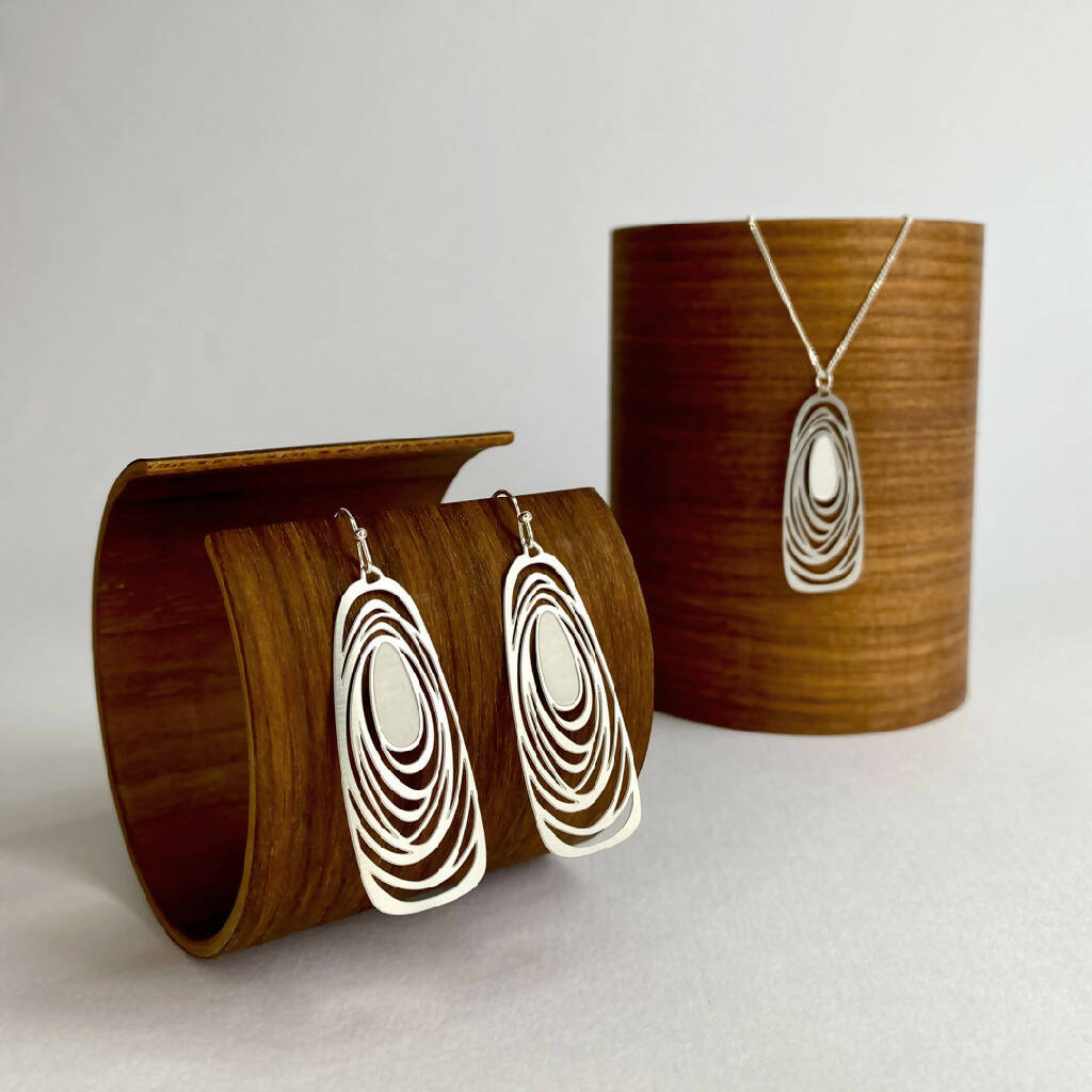 go-do-good-eddy-earrings-and-pendant-necklace-on-wood1