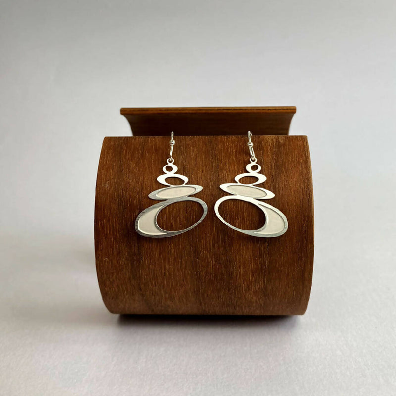 go-do-good-pebble-earings-small-on-wood