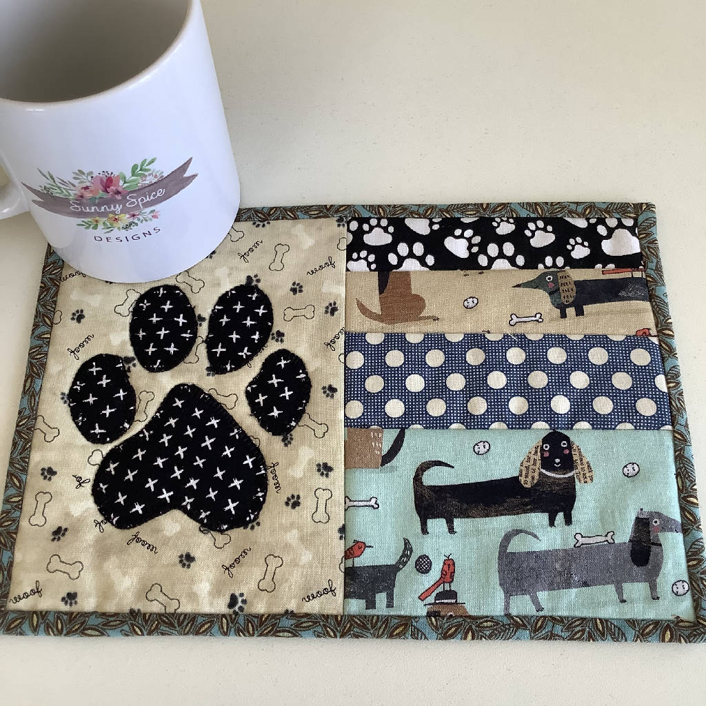 Paw print mug rug