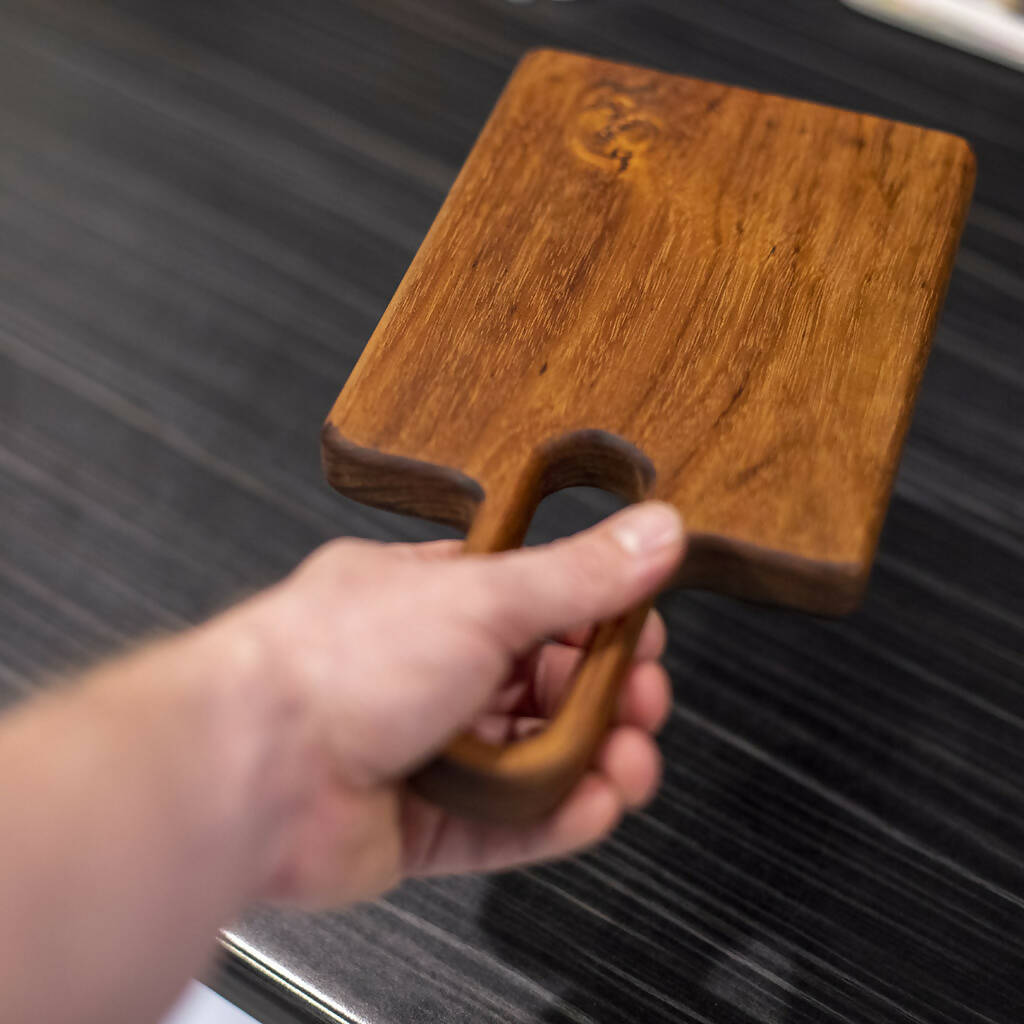 Tasmanian Blackwood serving/chopping board with a long easy to hold handle