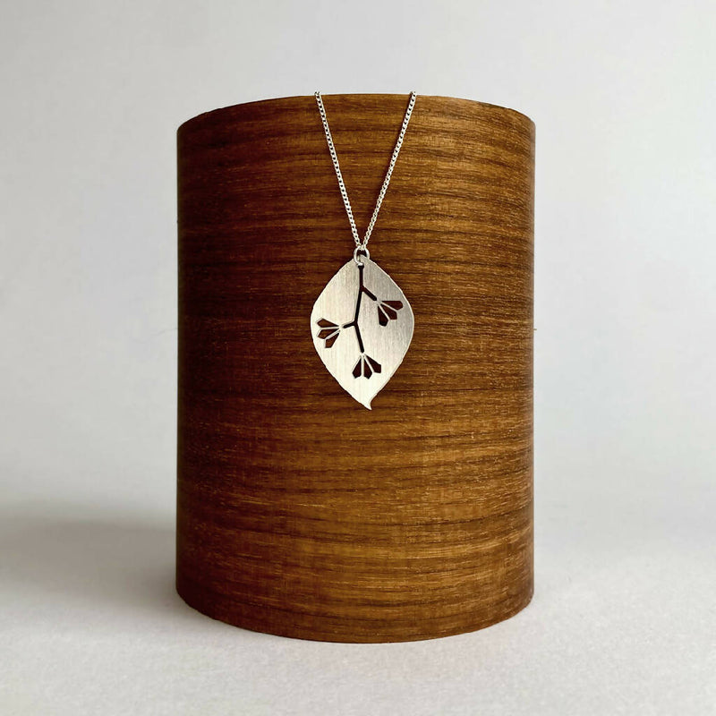 go-do-good-gum-leaf--pendant-necklace-on-wood