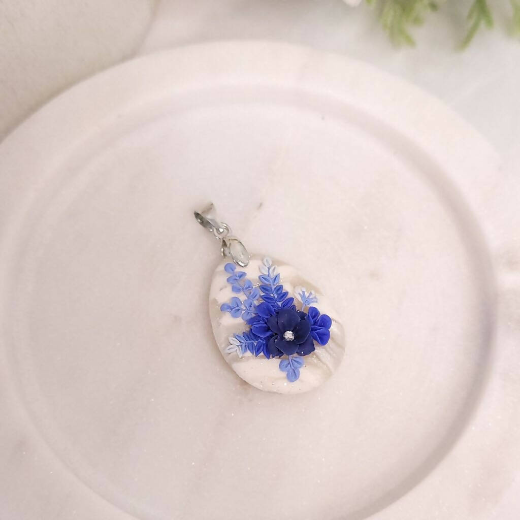 Blue floral cluster earrings. Intricate flower jewellery. Handmade polymer clay pieces.