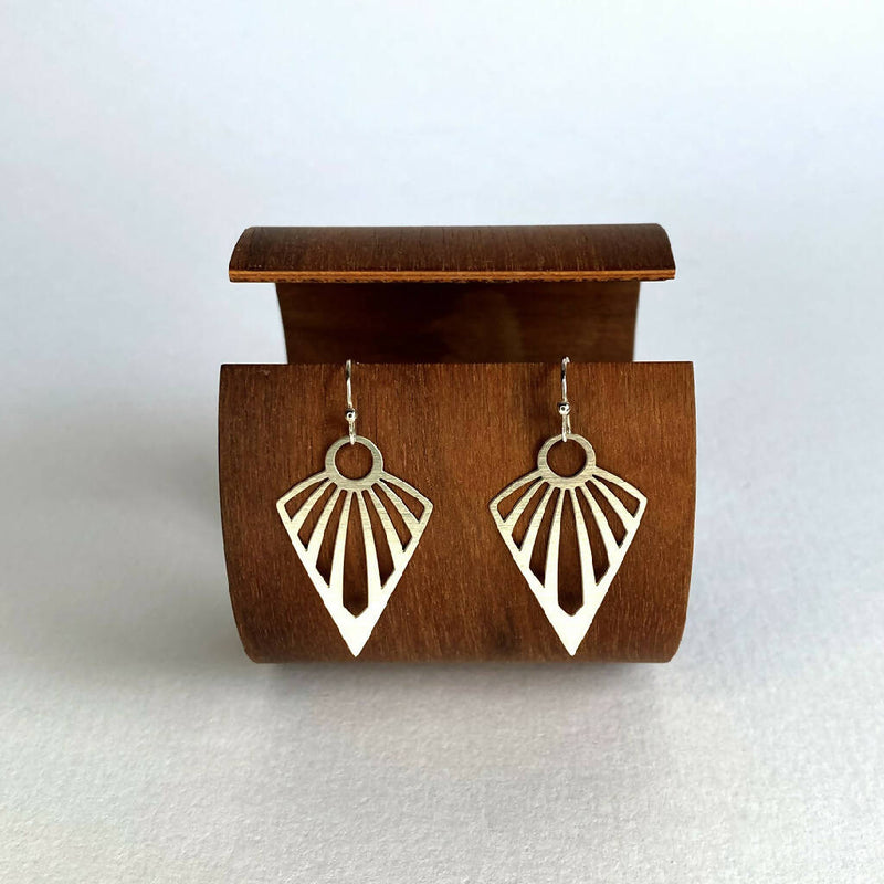 go-do-good-eclipse-art-deco-earringson-wood2